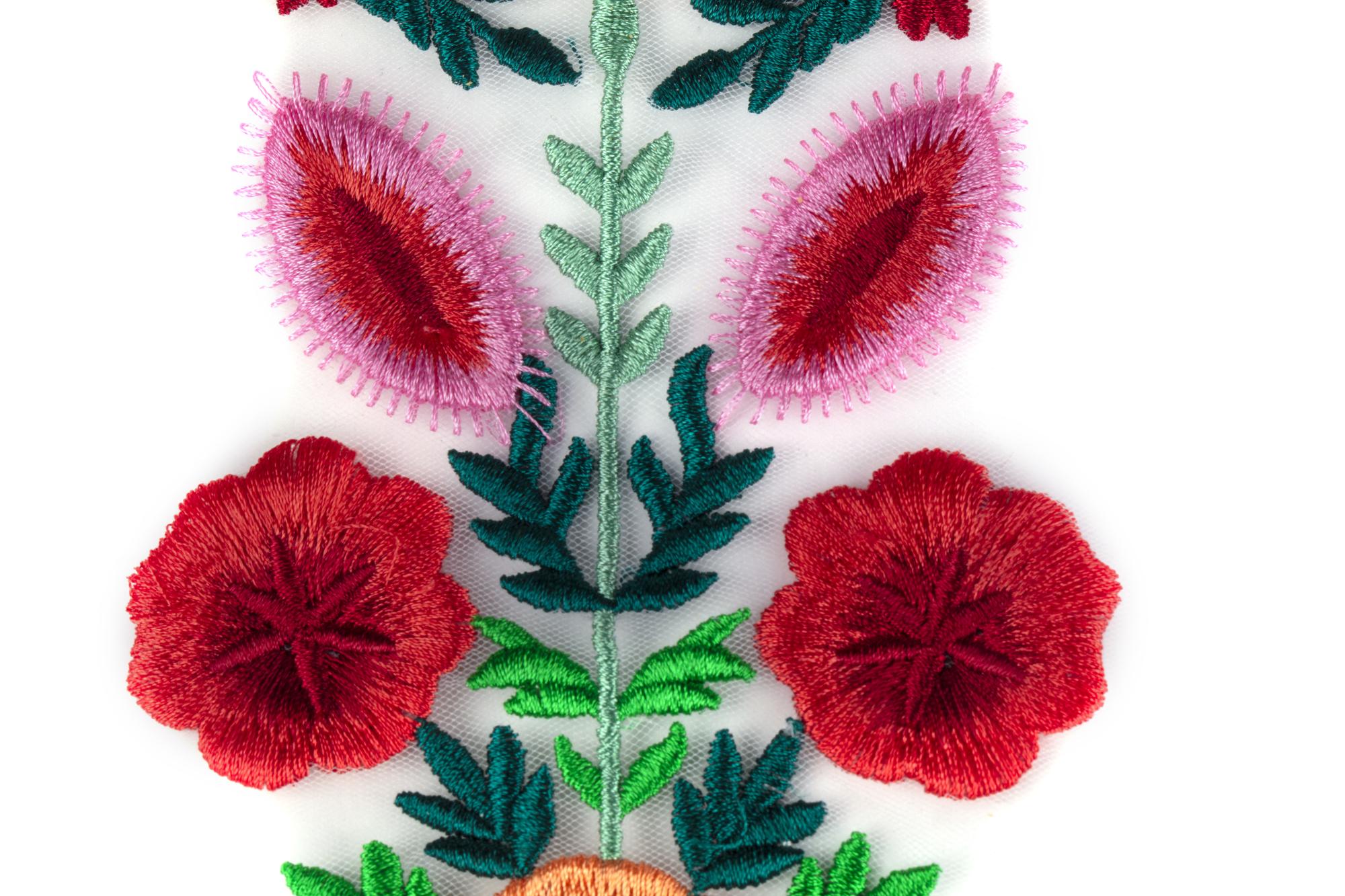 detail of embroidered flower motif